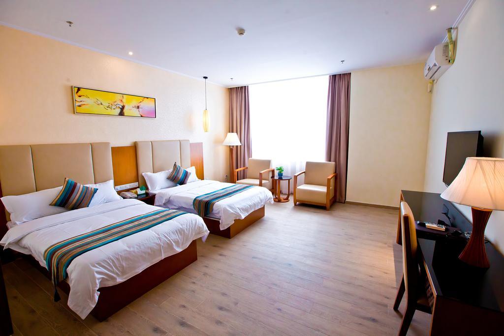 Shanghui International Hotel Canton Chambre photo