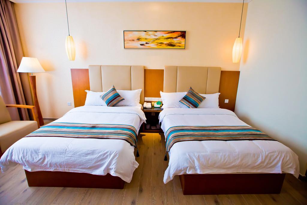 Shanghui International Hotel Canton Chambre photo
