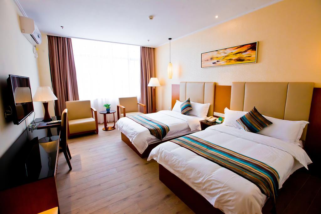 Shanghui International Hotel Canton Chambre photo