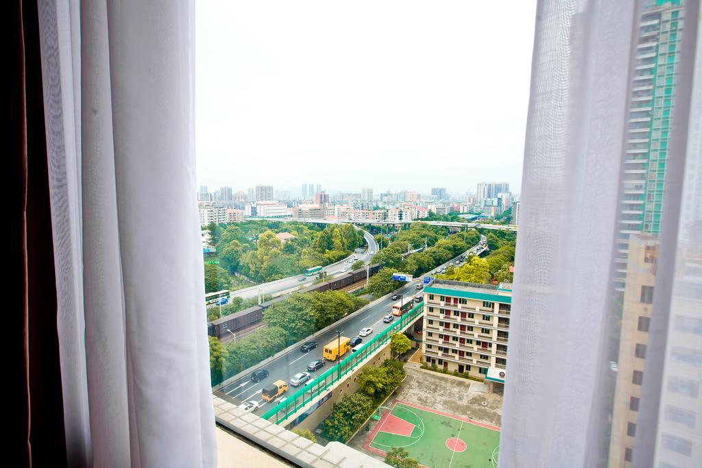 Shanghui International Hotel Canton Chambre photo