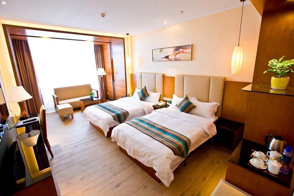 Shanghui International Hotel Canton Chambre photo